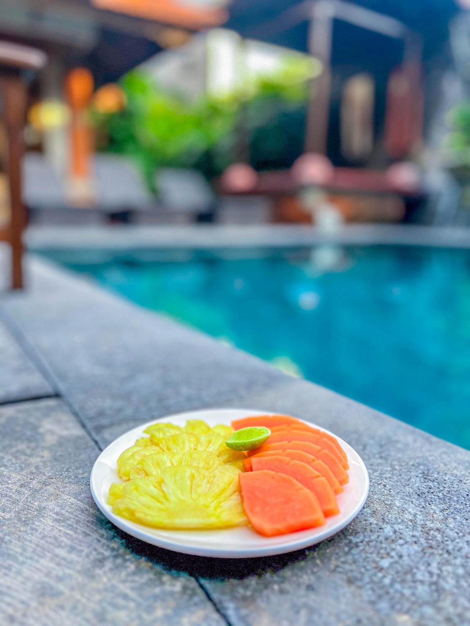 Puri Mango Guest House Sanur Exterior photo