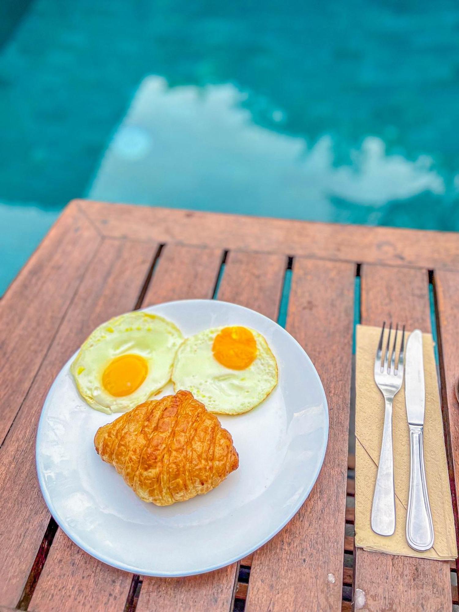 Puri Mango Guest House Sanur Exterior photo