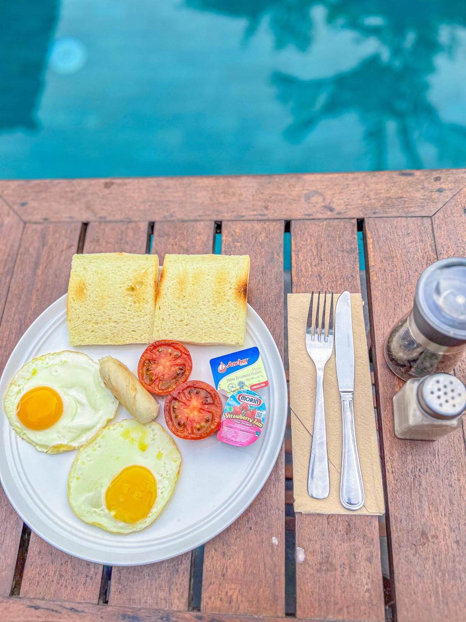 Puri Mango Guest House Sanur Exterior photo