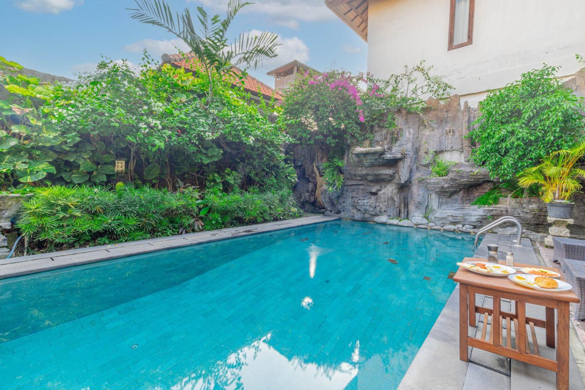 Puri Mango Guest House Sanur Exterior photo